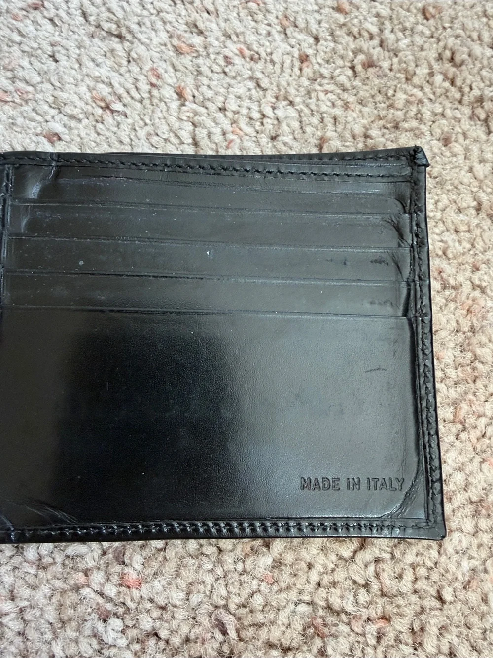 Prada Black Leather Bifold Wallet with Metal Logo Corner